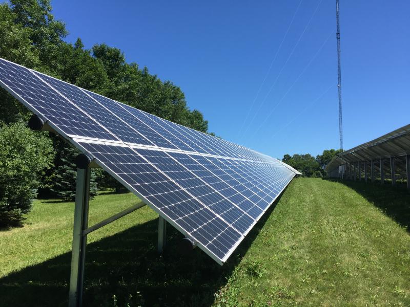 side view Radio Tower community solar installation